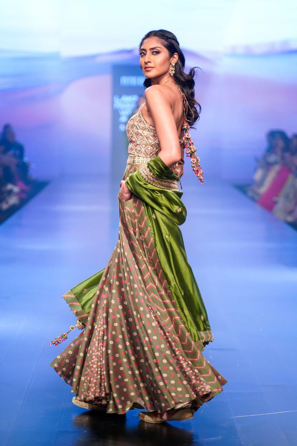 Kacha Aam Halter Neck Blouse With Skirt And Dupatta