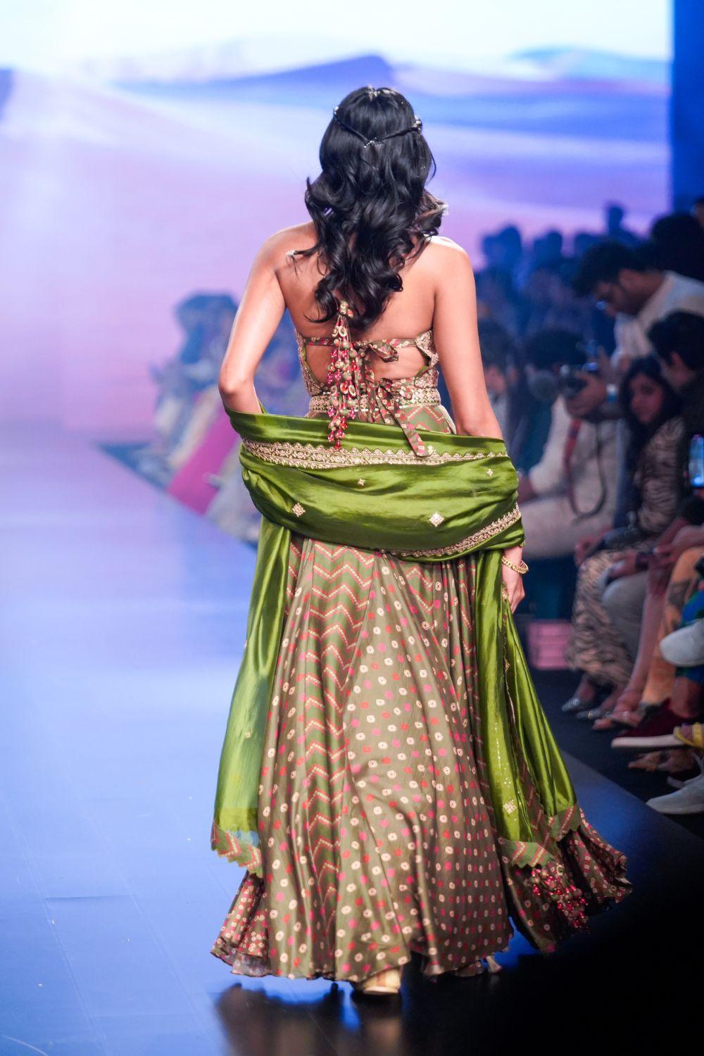 Kacha Aam Halter Neck Blouse With Skirt And Dupatta