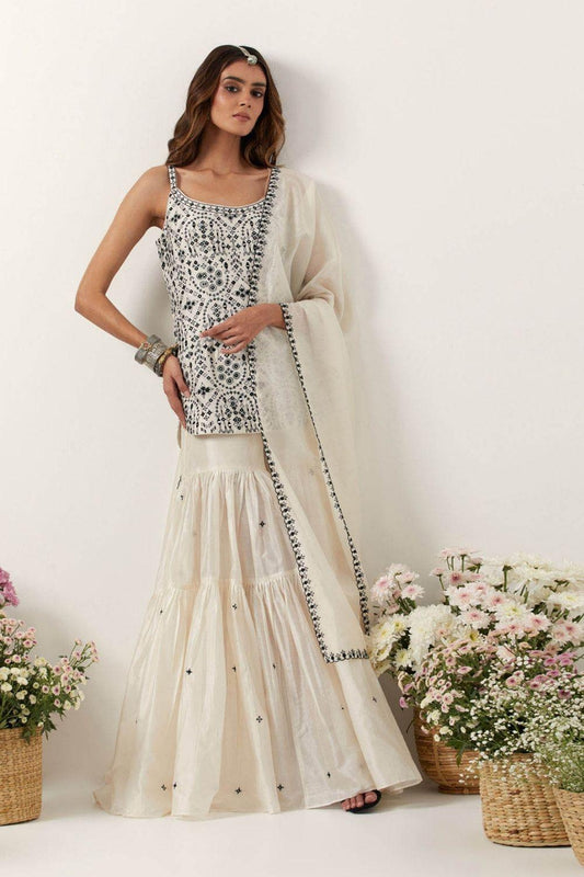 Ivory Strappy Short Kurti Paired With Gharara & Dupatta