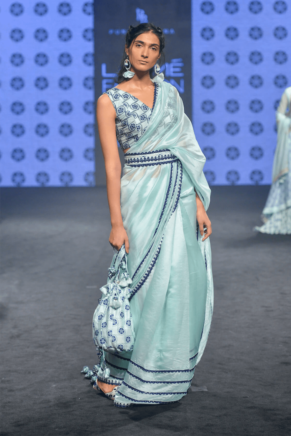Powder Blue Saree Paired With Blouse