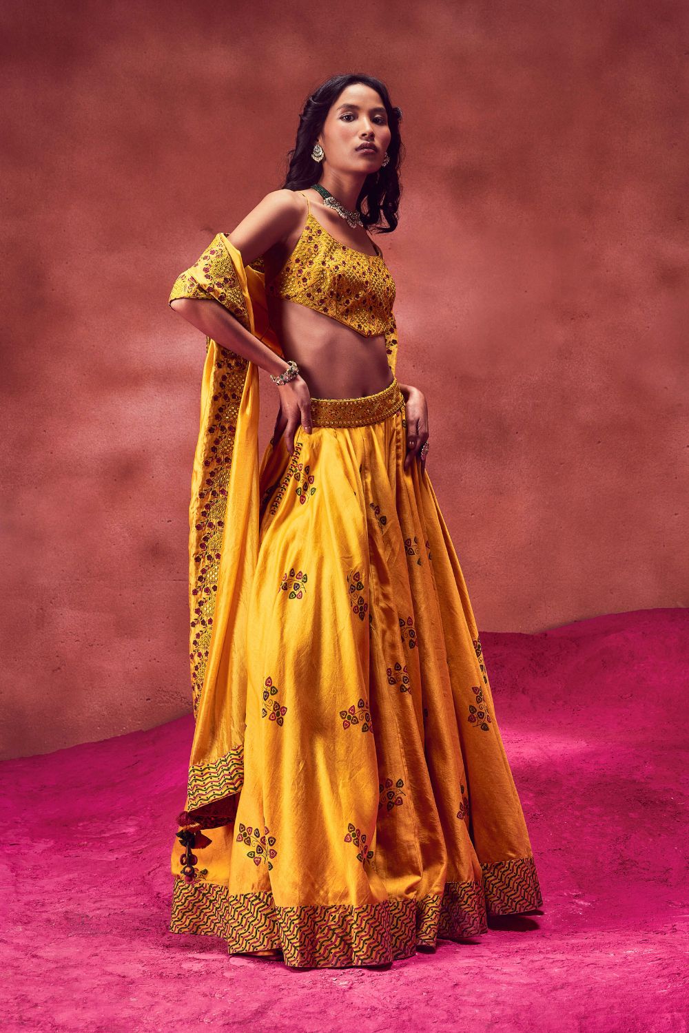 Bright yellow lehenga in silk with contrast blouse adorn in zari and resham  work only on Kalki